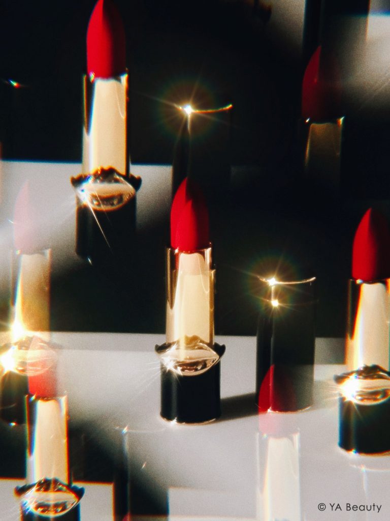 Pat McGrath Labs MatteTrance Lipstick seen through a prism glass