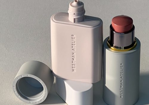 Striking photograph of Westman Atelier Vital Skincare Complexion Drops and Baby Cheeks Blush Stick in shade Petal stacked together, set against a clean, gray background.